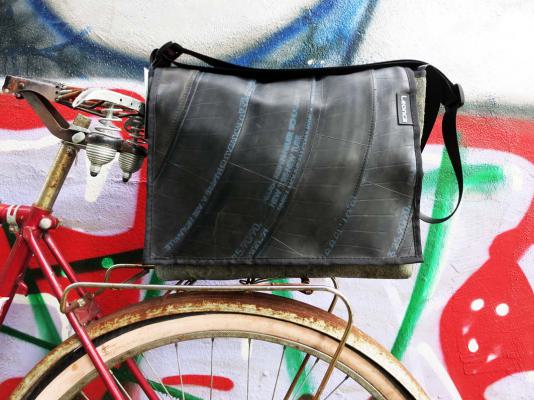 Upcycling bag made from used motorcycle hose and amry tent linen